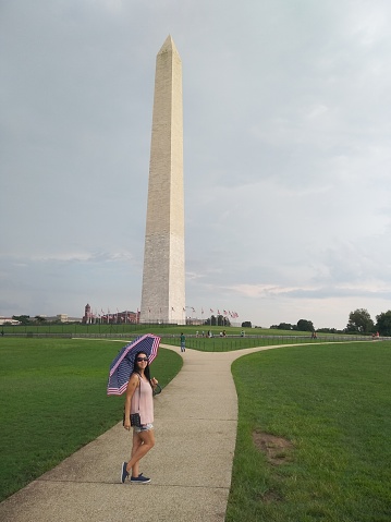 Image of a woman with umbrella in Washignton