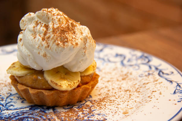 Banoffee Pie. Traditional English dessert prepared with banana and dulce de leche or caramel stock photo