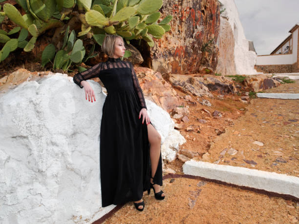 istock Young woman posing with party dress 1281500945