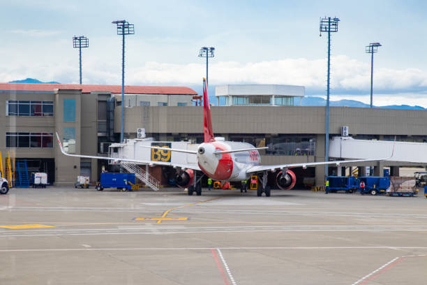 Airplane of the Avianca airline at its parking spot in the Alfonso Bonilla Aragon airport near to Cali city in Colombia Palmira, Colombia - October, 2020: Airplane of the Avianca airline at its parking spot in the Alfonso Bonilla Aragon airport near to Cali city in Colombia palmira colombia stock pictures, royalty-free photos & images