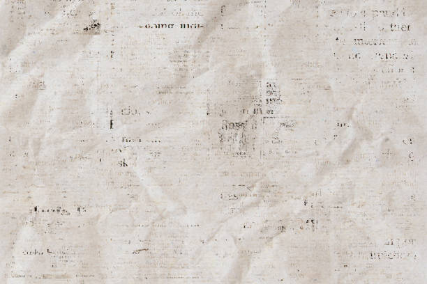 istock Newspaper paper grunge vintage old aged texture background 1281501866