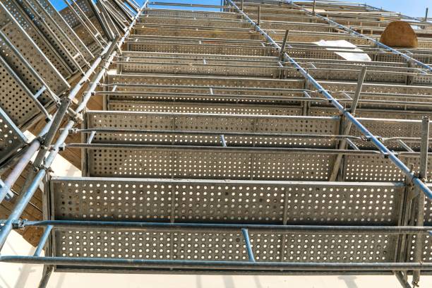 istock Modern steel scaffolding. Scaffold. Construction Scaffoldings. Construction site 1281507250