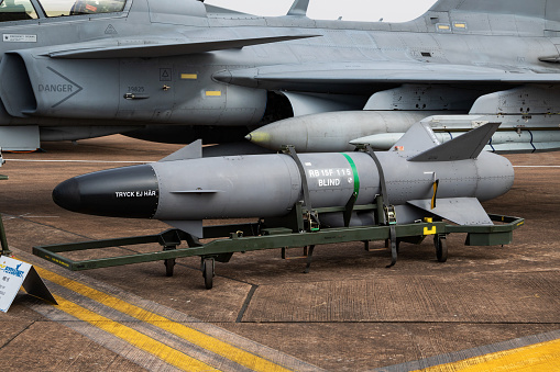 2018: Swedish Air Force SAAB JAS 39C Gripen 39293 fighter jet and RBS-15 missile static display at RIAT Royal International Air Tattoo 2018 airshow
