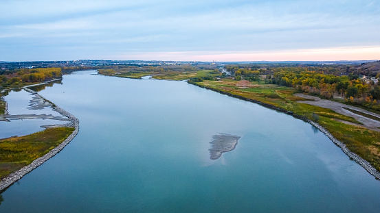 North-facing aerial view over the Missouri River at daybreak just outside Bismark, North Dakota.