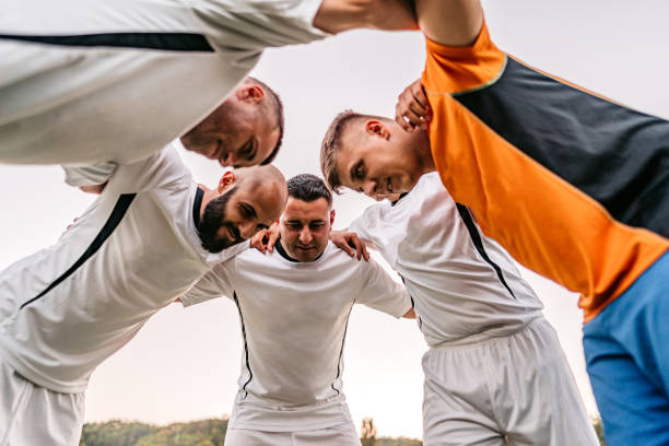 istock Soccer players huddling before game 1281512006