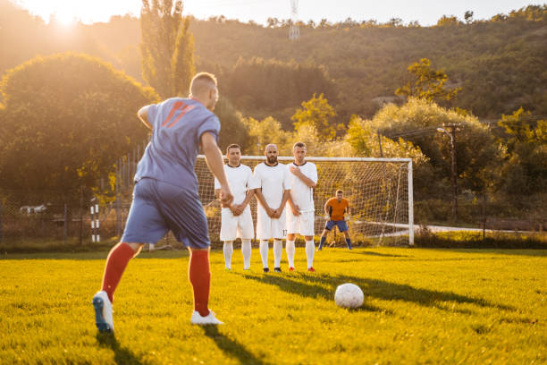 istock Soccer player taking free kick 1281512673
