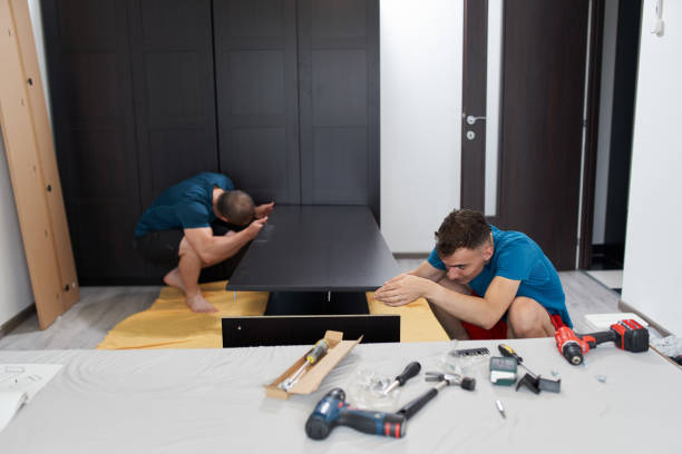 istock Father and son assembling furniture in new home 1281512762