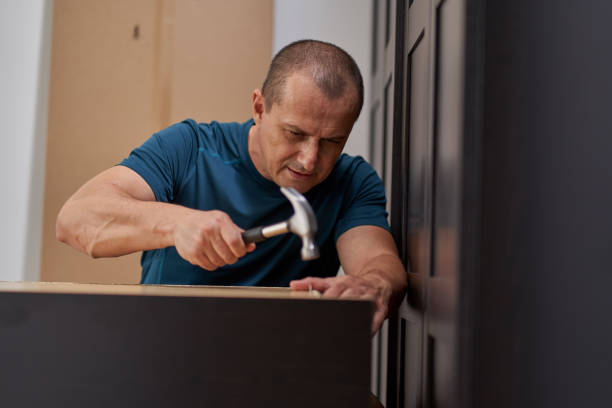 istock Man assembling his new furniture 1281512787
