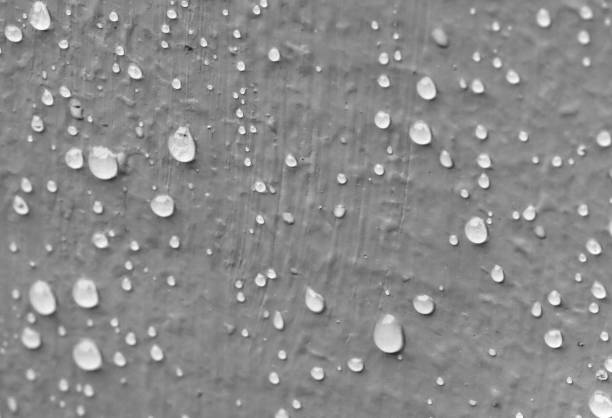 Wooden texture covered in rain drops
