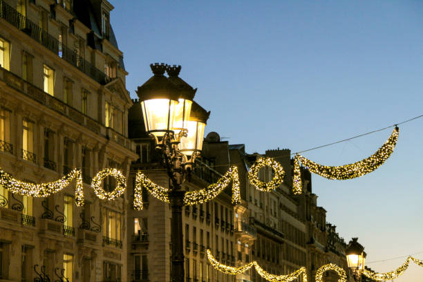 istock Decorating a Paris street with Christmas lights 1281513985