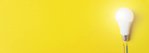 istock Glowing bulb with wires phase, zero on yellow background, uniqueness concept. Idea, innovation, creativity concept, design template, panoramic, copy space. 1281514084