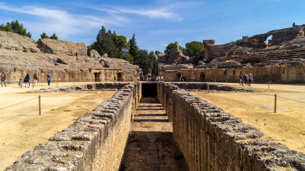 Amphitheater of the ancient Roman city called Italica (Santiponce, Andalusia/Spain). Santiponce, Spain - October 18th 2020: The amphitheater is one of the largest of the Roman Empire and it was built by the Emperor Hadrian. Place where numerous shows with beasts and gladiators were held. italica spain stock pictures, royalty-free photos & images