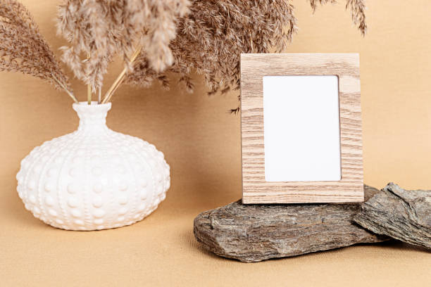 istock Mockup with wooden frame and natural elements 1281515337