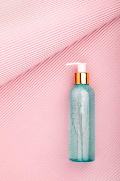 istock Transparent bottle dispenser cosmetic serum, micellar gel. 1281515458