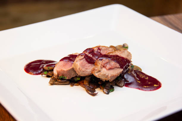 istock Duck breast with red fruit sauce and mushroom 1281516713