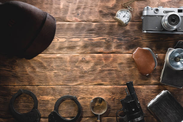 Detective. Detective spy agent desk table flat lay background with copy space. wallet gun stock pictures, royalty-free photos & images