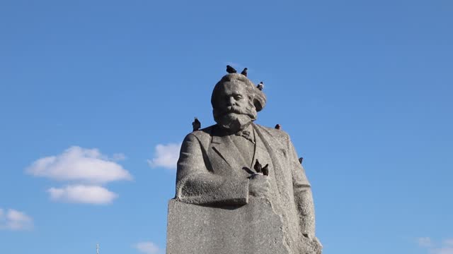 Monument to Karl Marx in Moscow, close-up, summer day.