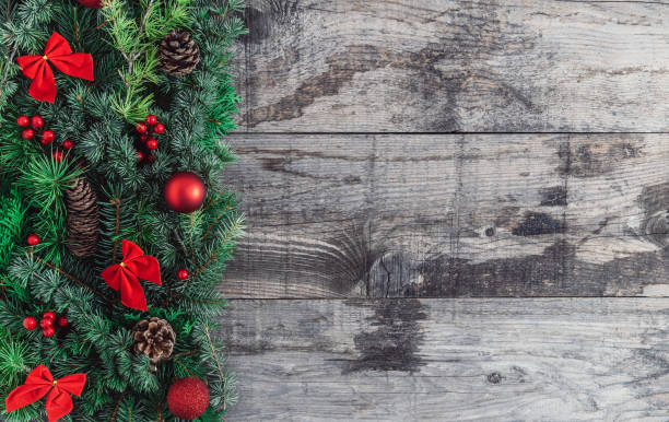 istock Christmas holiday garland on an old rustic wood background 1281524145