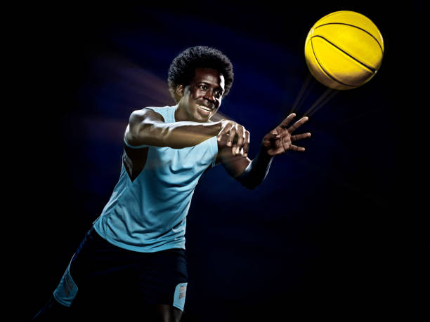 istock young african basketball player man isolated black background 1281528198