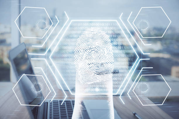 istock Computer on desktop in office with finger print drawing. Double exposure. Concept of business data security. 1281528984