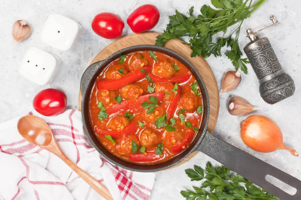 istock Meatballs with red bell pepper in garlic tomato sauce 1281529140