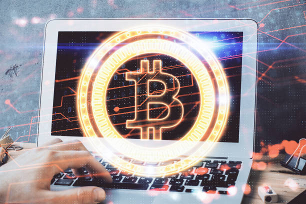 istock Crypto currency theme hologram with businessman working on computer on background. Concept of blockchain. Double exposure. 1281529169