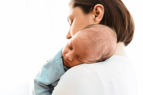 istock Mother with newborn baby son 1281531880