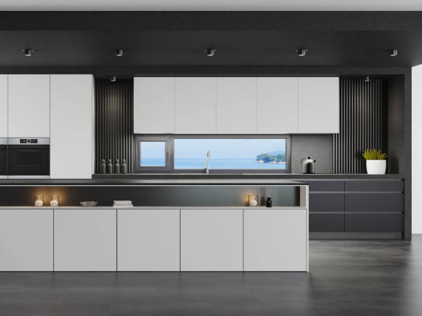 istock Luxurious matte black and white minimalist Italian style kitchen interior with long island table 1281532836
