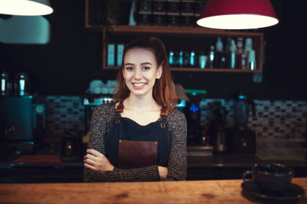 istock Small business: Happy owner of a cafe. 1281535500
