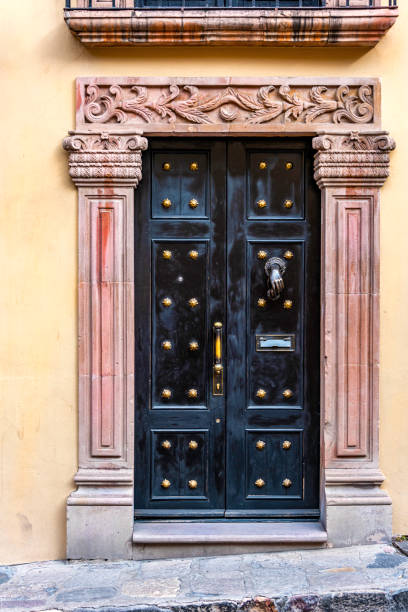 istock Dark wood door 1281537125