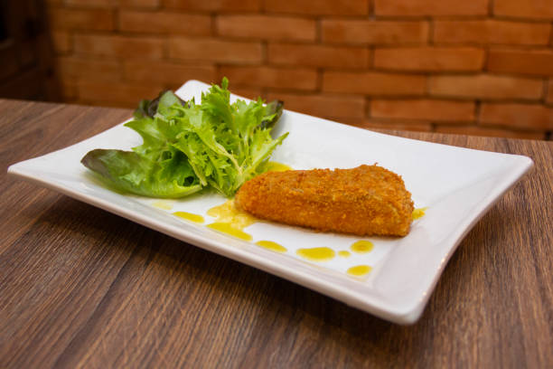 istock Crispy cheese with salad to accompany 1281537545