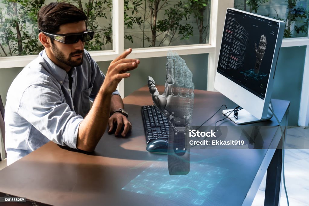 engineer in smart factory which use futuristic technology combine big data, iot, 5g, machine deep learning, automation robot, augmented mixed virtual reality, digital twin, artificial intelligence Technology Stock Photo