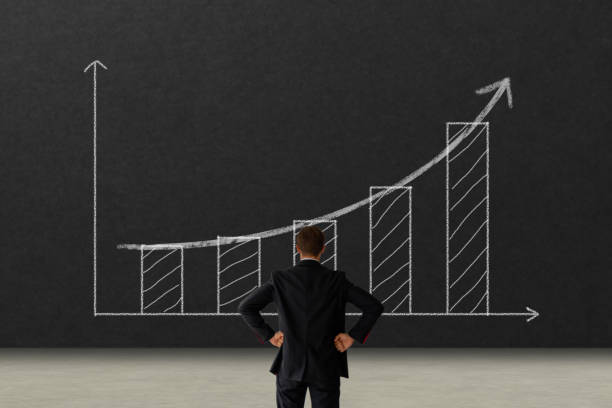 istock Business growth concept. business man looking to the graph with growth performance and keep goal for success 1281538276