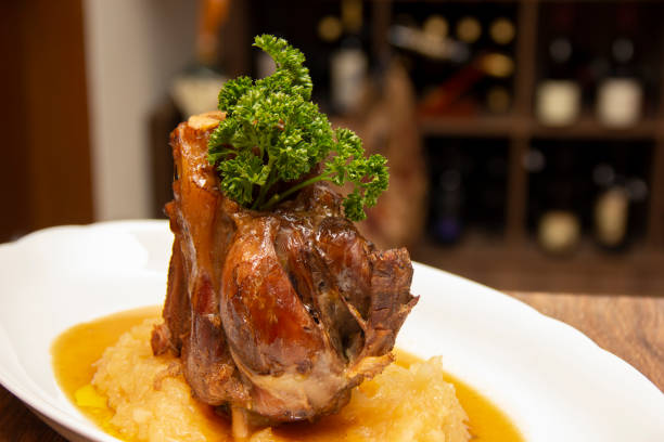 istock Stinco pork with green apple puree. Traditional Eisbein 1281539067