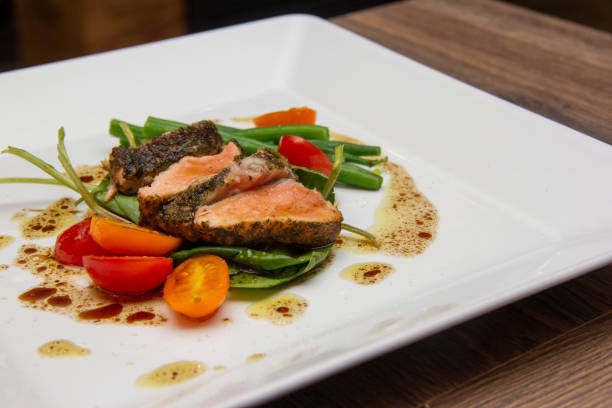 istock Salad Nicoise, prepared with Salmon in Herbs Croute 1281539231
