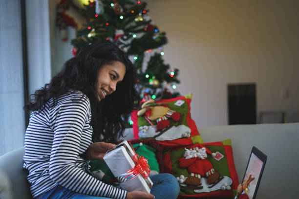 istock christmas young couple celebrating 1281540057