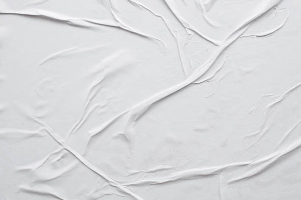 Blank white crumpled and creased paper poster texture background
