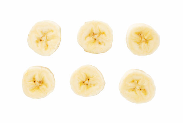 istock Sliced bananas on a white background, taken from above 1281545751