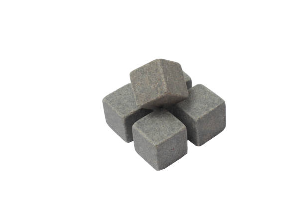 istock Whiskey stones close-up, isolate on a white background, place for text. 1281561180