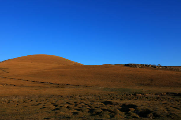 A majestic peak of a snow-capped mountain in the eastern grasslands area of Tibet called Kham
