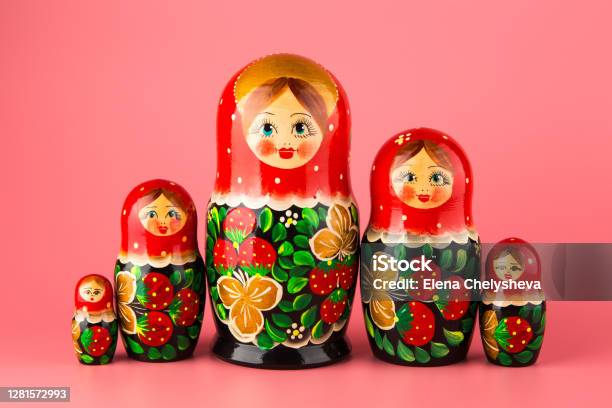 Set Of Wooden Toys Matryoshka On A Pink Background Stock Photo - Download Image Now - Russian Nesting Doll, Babushka, Toy
