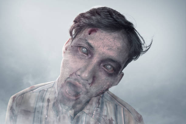 istock Scary zombie with blood and wound on his body standing 1281573121