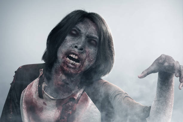 istock Scary zombie with blood and wound on his body walking 1281573943