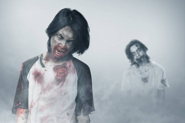 istock Scary zombie with blood and wound on his body standing 1281573967
