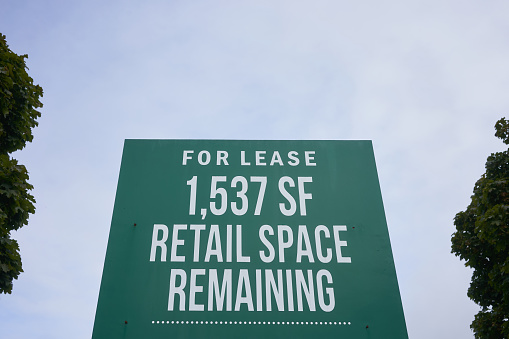 Beaverton, OR, USA - Oct 14, 2020: Retail space for lease sign outside a shopping center.