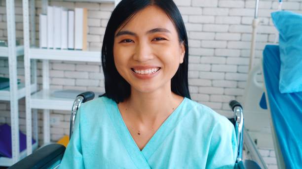 istock Happy patient getting well improvement at hospital 1281574999