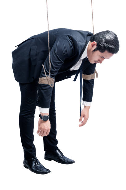 istock Asian businessman controlled with rope 1281575124