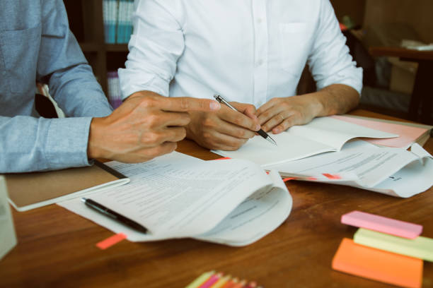 istock Teenager studying at desk and doing homeworks 1281577341