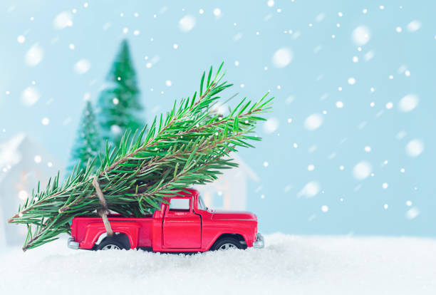 istock toy car with fir branches 1281580229