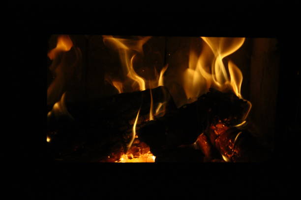 istock Fire and flames with a burning dark yellow-blured background. 1281581653
